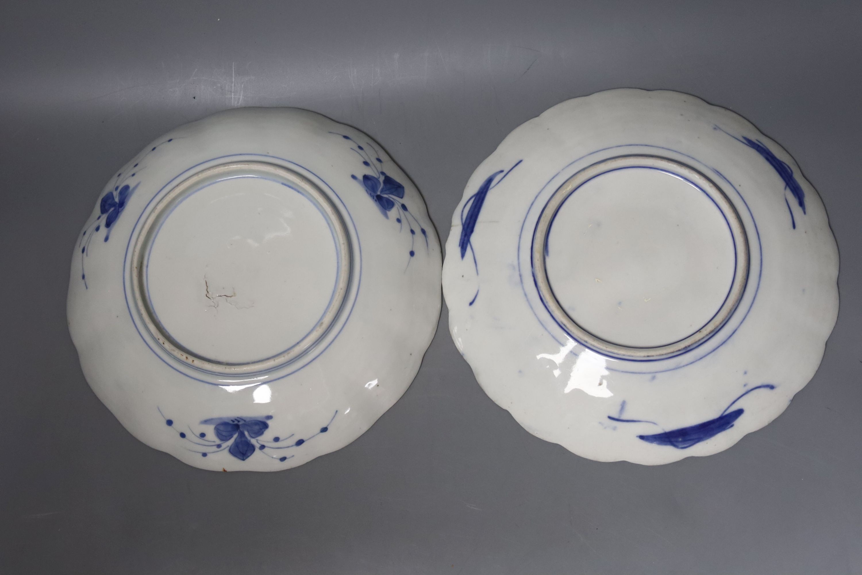 A Chinese Qianlong ‘double peacock’ octagonal plate, 21.5cm and two Imari dishes